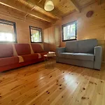 Letniskowy Nad Jeziorem, Las, Mazury Holiday home *