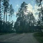 Letniskowy Nad Jeziorem, Las, Mazury Holiday home *